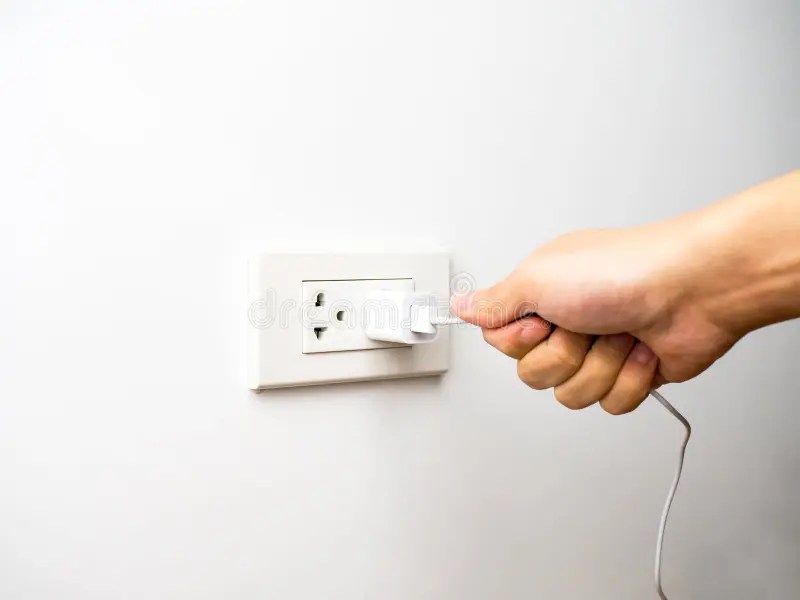 Pulling the plug stock image. Image of hand, outlet, electricity 12473749