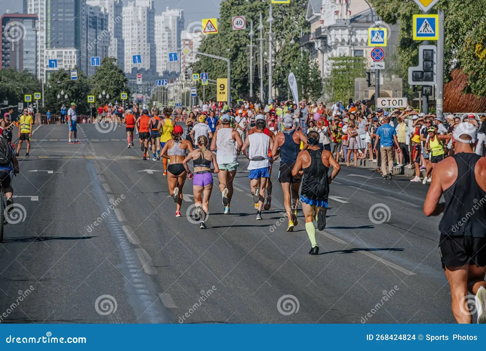 Back Group Male and Female Runners Running in Europe - Gel French Manicure