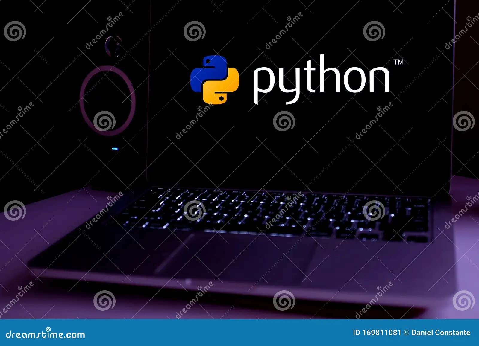 Computer with the Python Logo is an Interpreted Programming Language