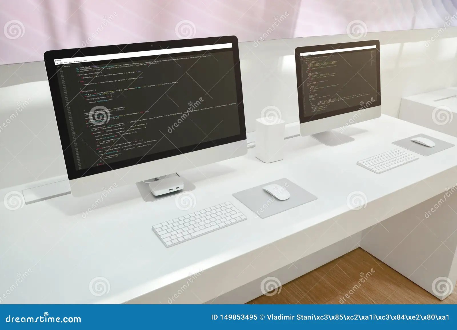 Developer`s Office. Two Computer Displays with Code Editors Stock Image