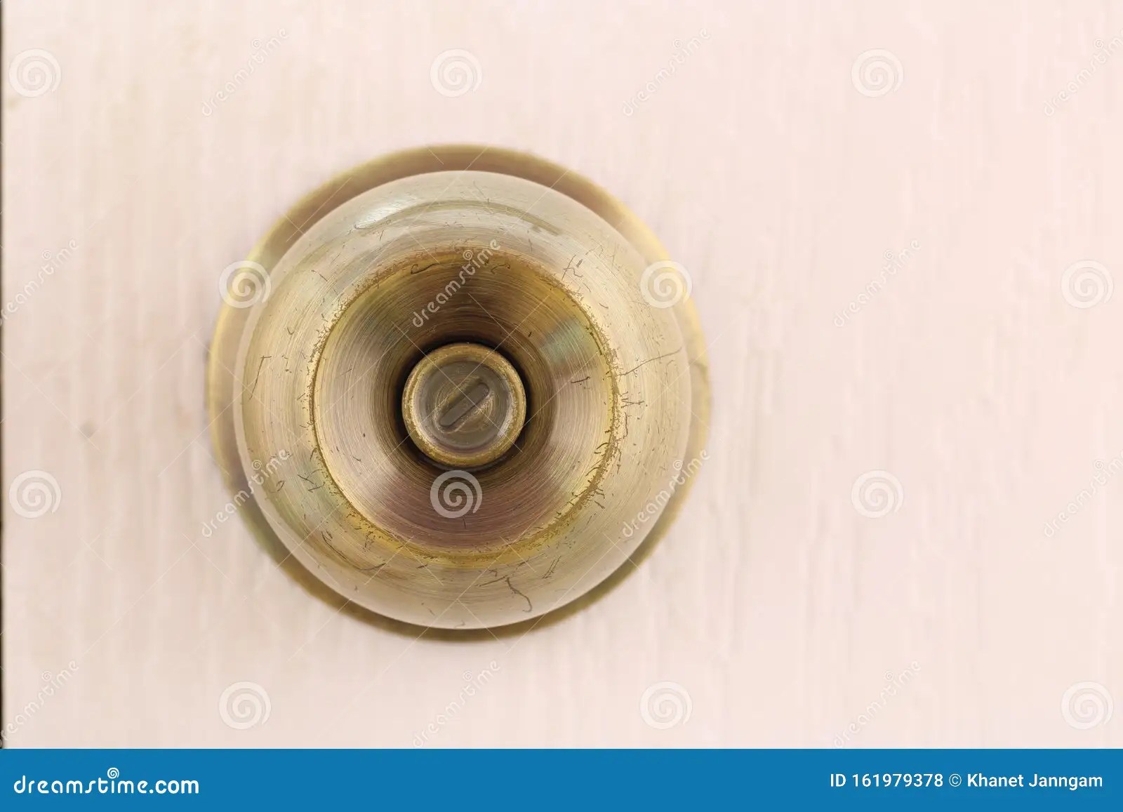 Door knobs on white doors stock photo. Image of brown 161979378