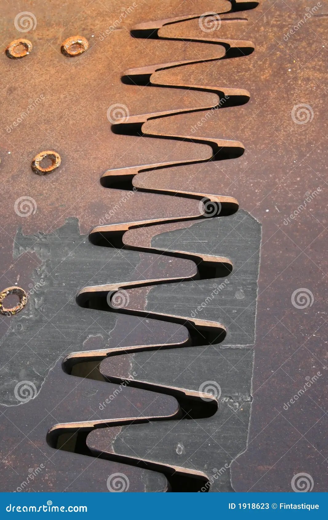 Metal interlocking teeth stock image. Image of close