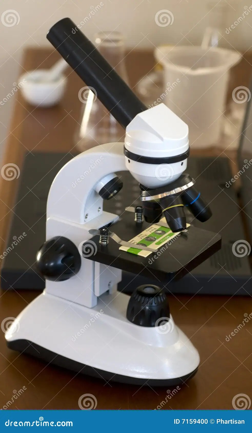 Microscope on table stock photo. Image of research, slide 7159400
