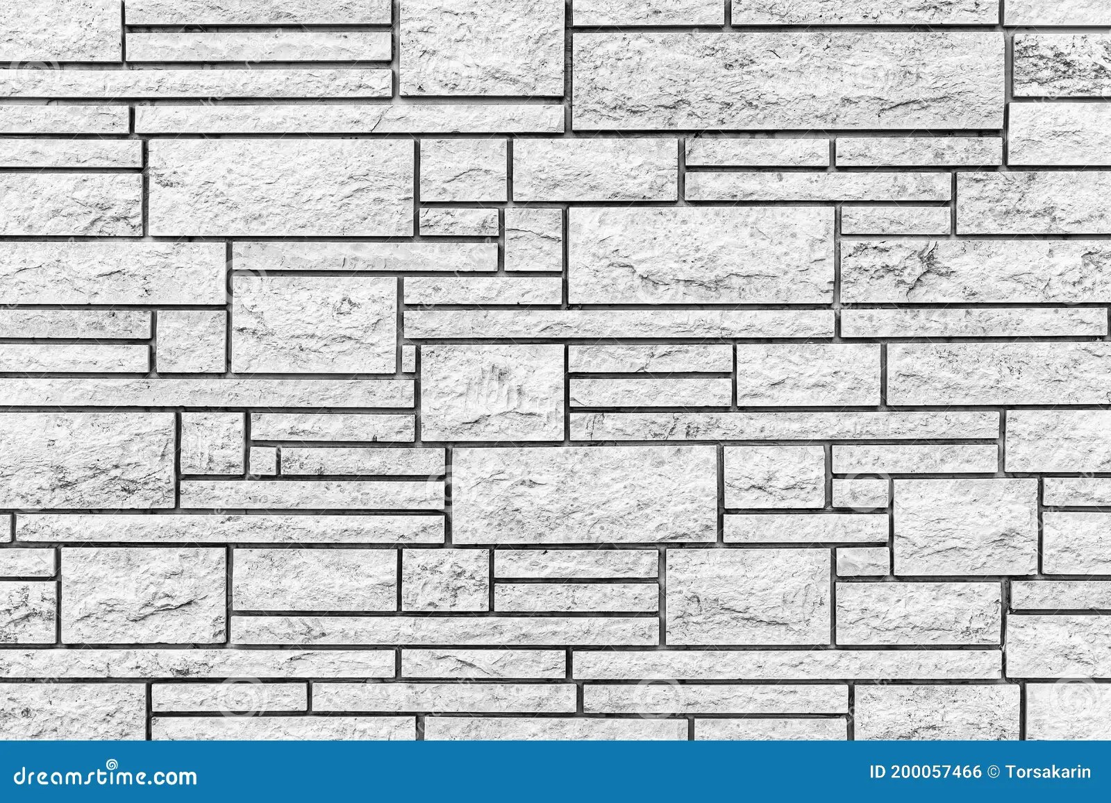 Pattern of White Stone Cladding Wall Tile Texture and Seamless