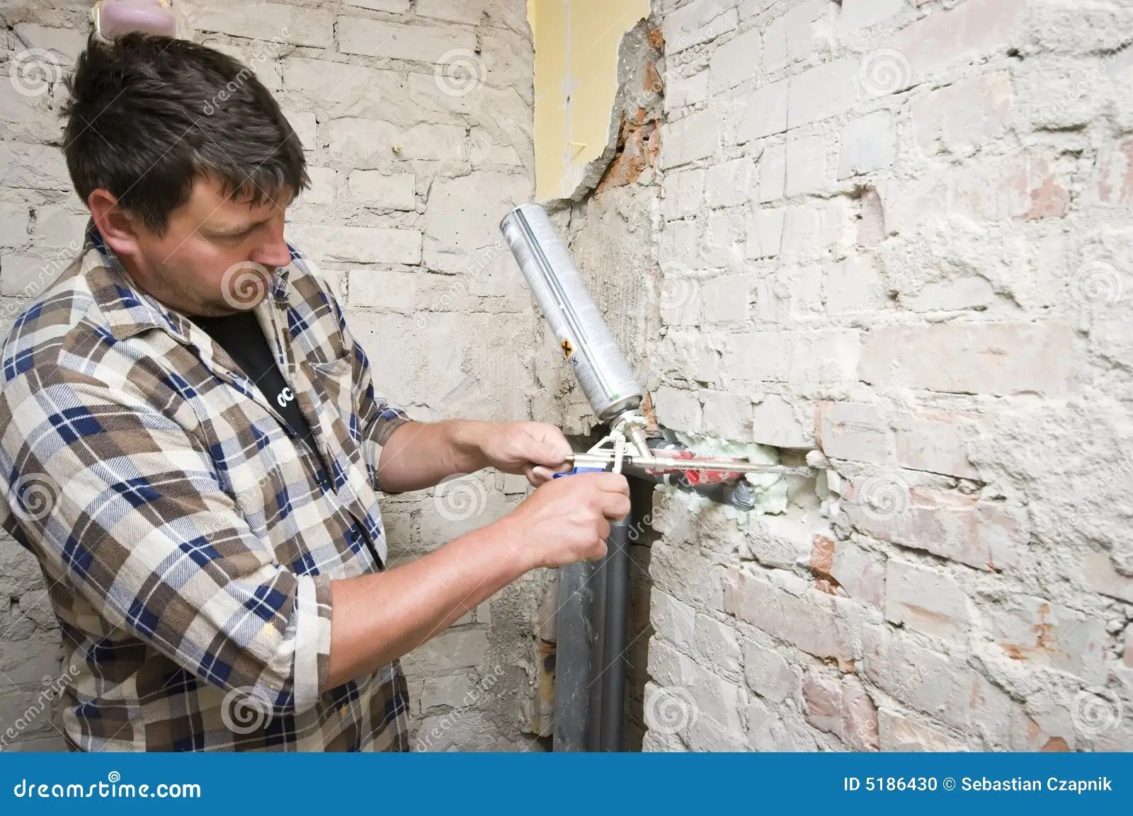 Plumber at work stock photo. Image of installing, work 5186430