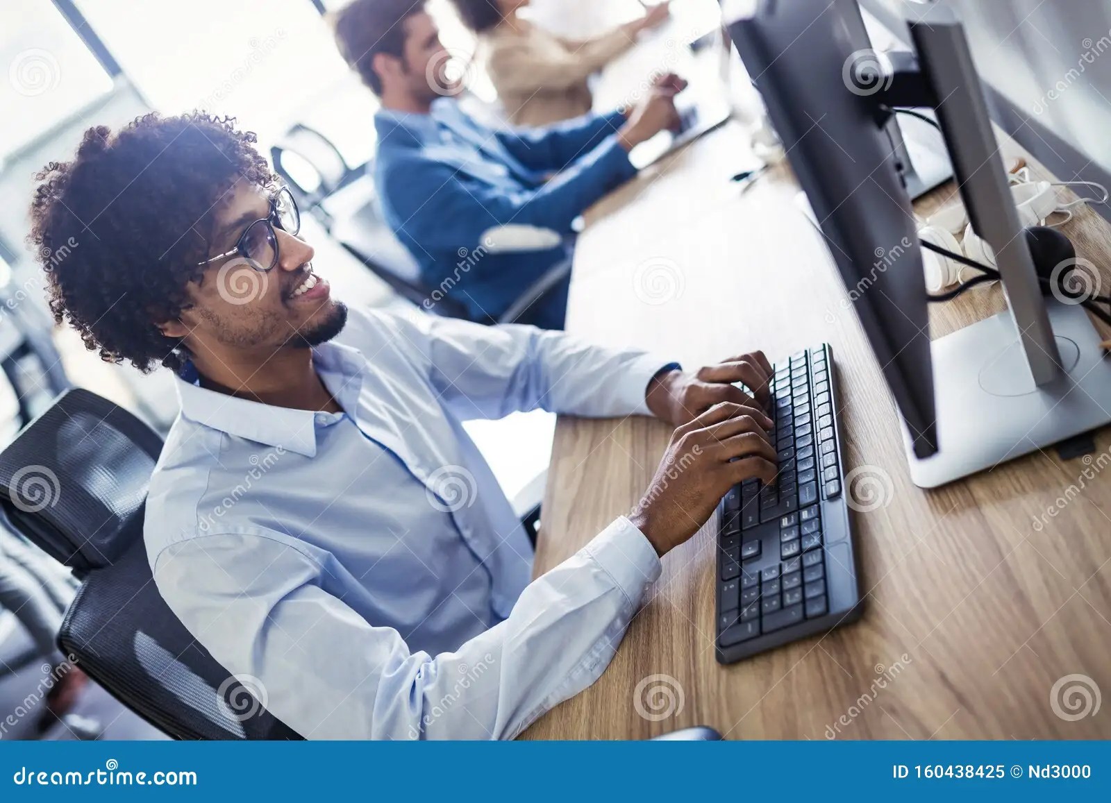 Programmers Cooperating at it Company Developing Apps Stock Image