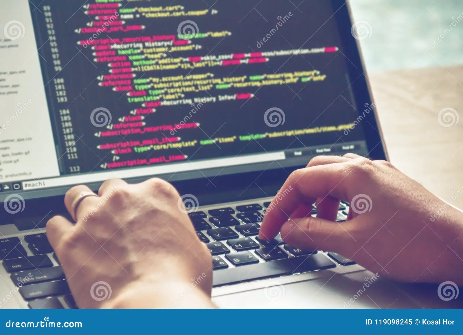Programming Work Time. Programmer Typing New Lines of HTML Code. Laptop