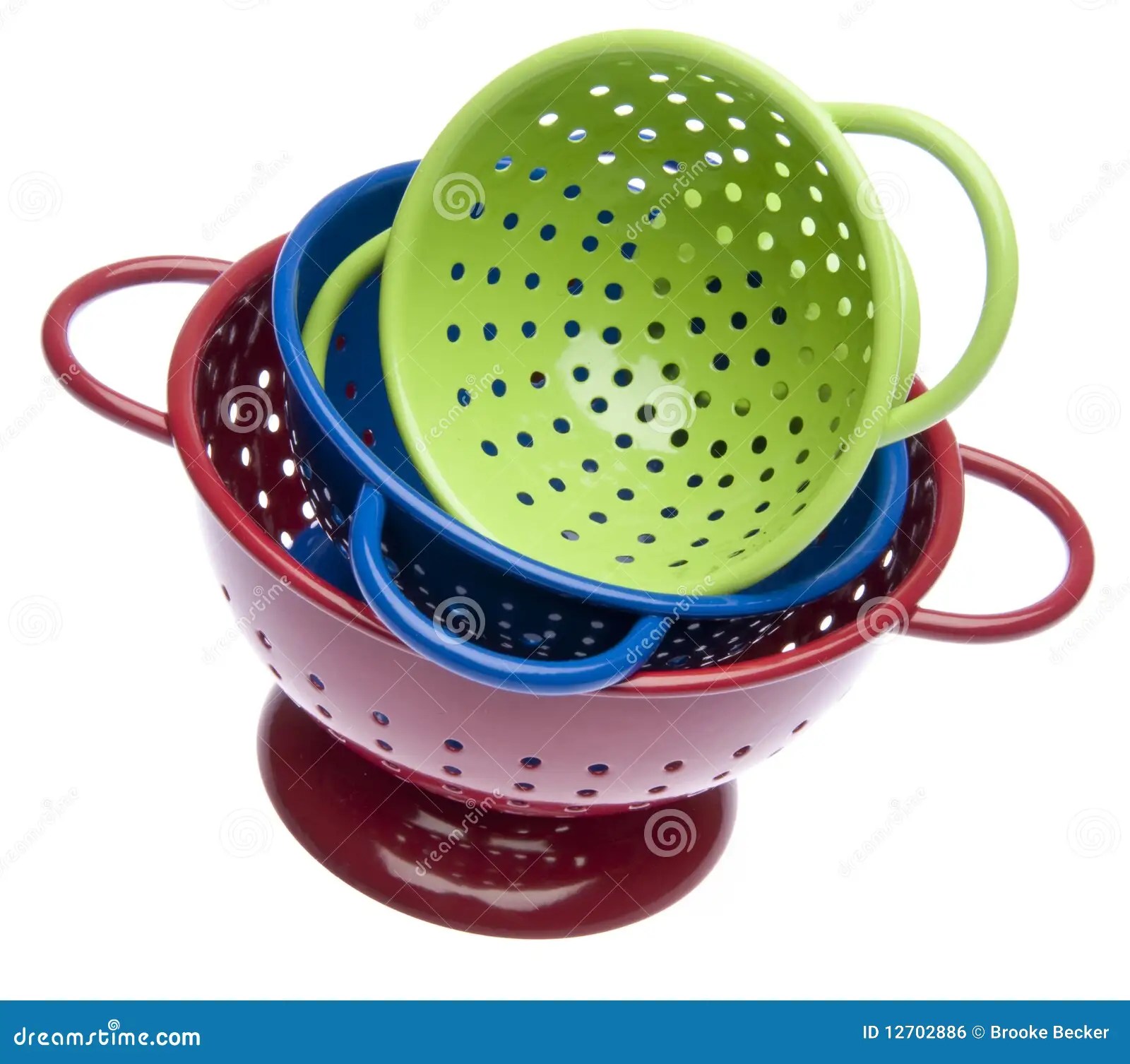 Stack of Bright Colanders stock photo. Image of white 12702886