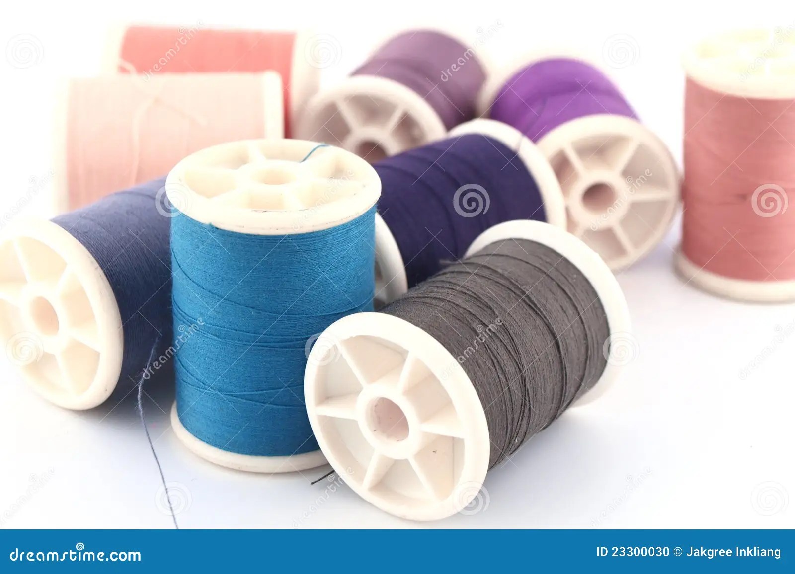 Threads in spools stock photo. Image of blue, white, vivid 23300030