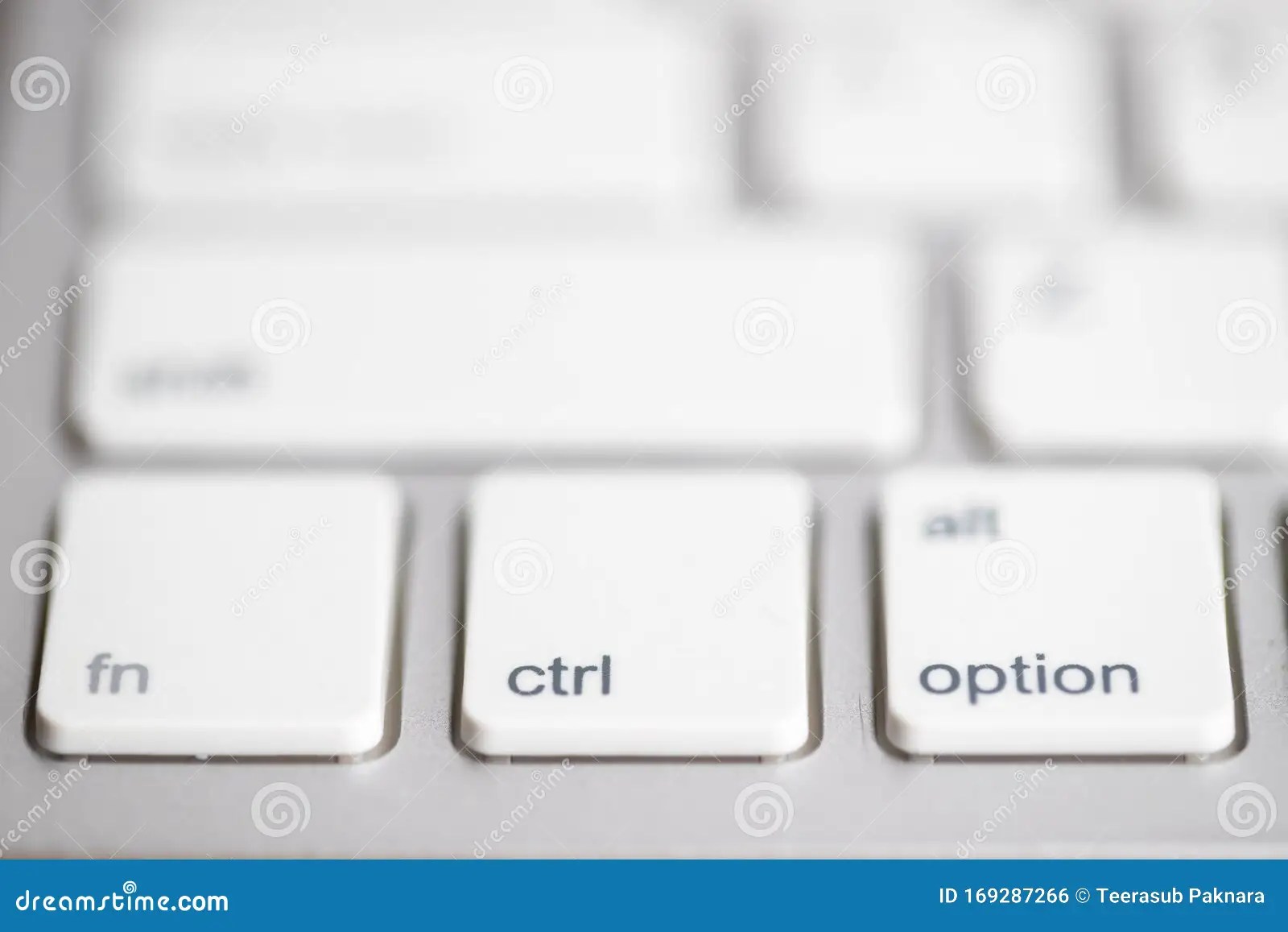 Three Buttons Close Up Computer White Keyboard and Others Blur Keys