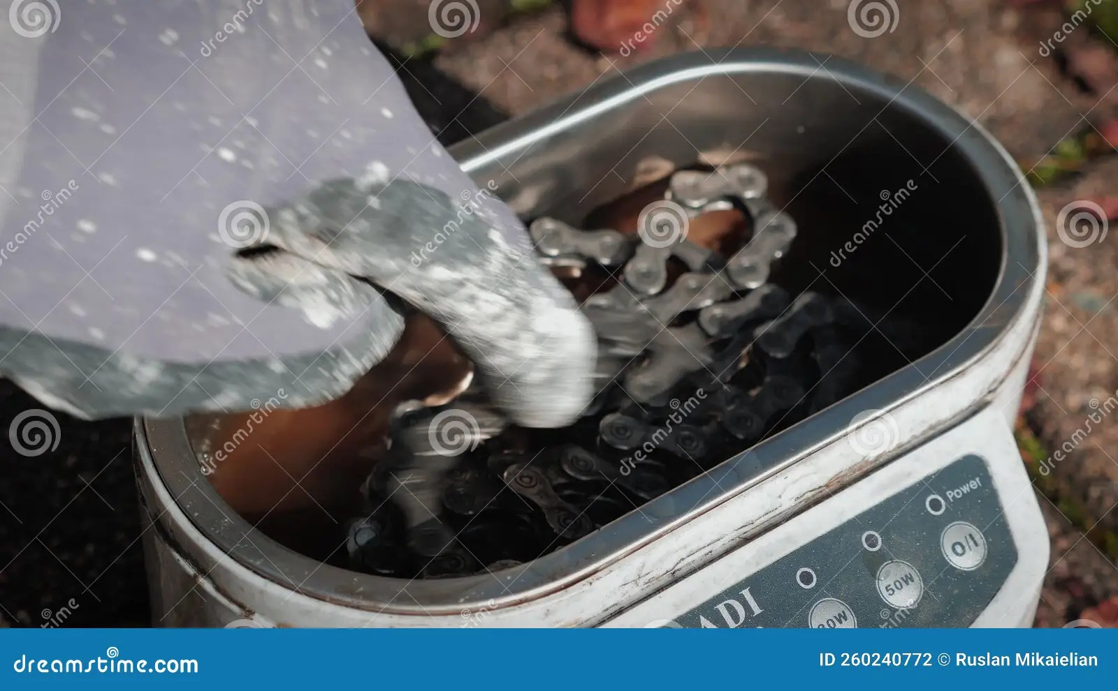 Using Ultrasonic Bath To Degrease Bicycle Chain. Cleaning Bike Chain