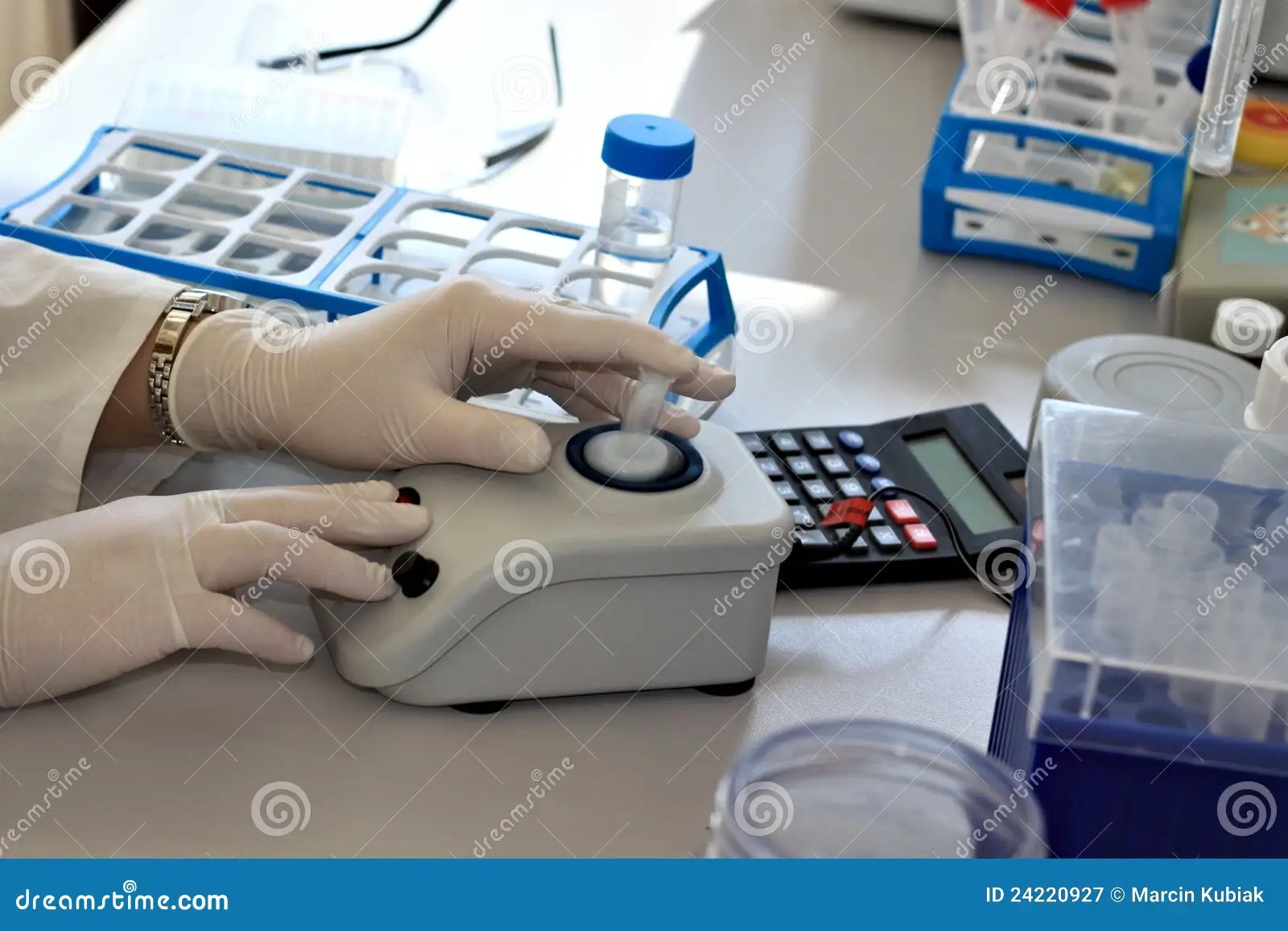 Vortexing the sample stock image. Image of calculator 24220927