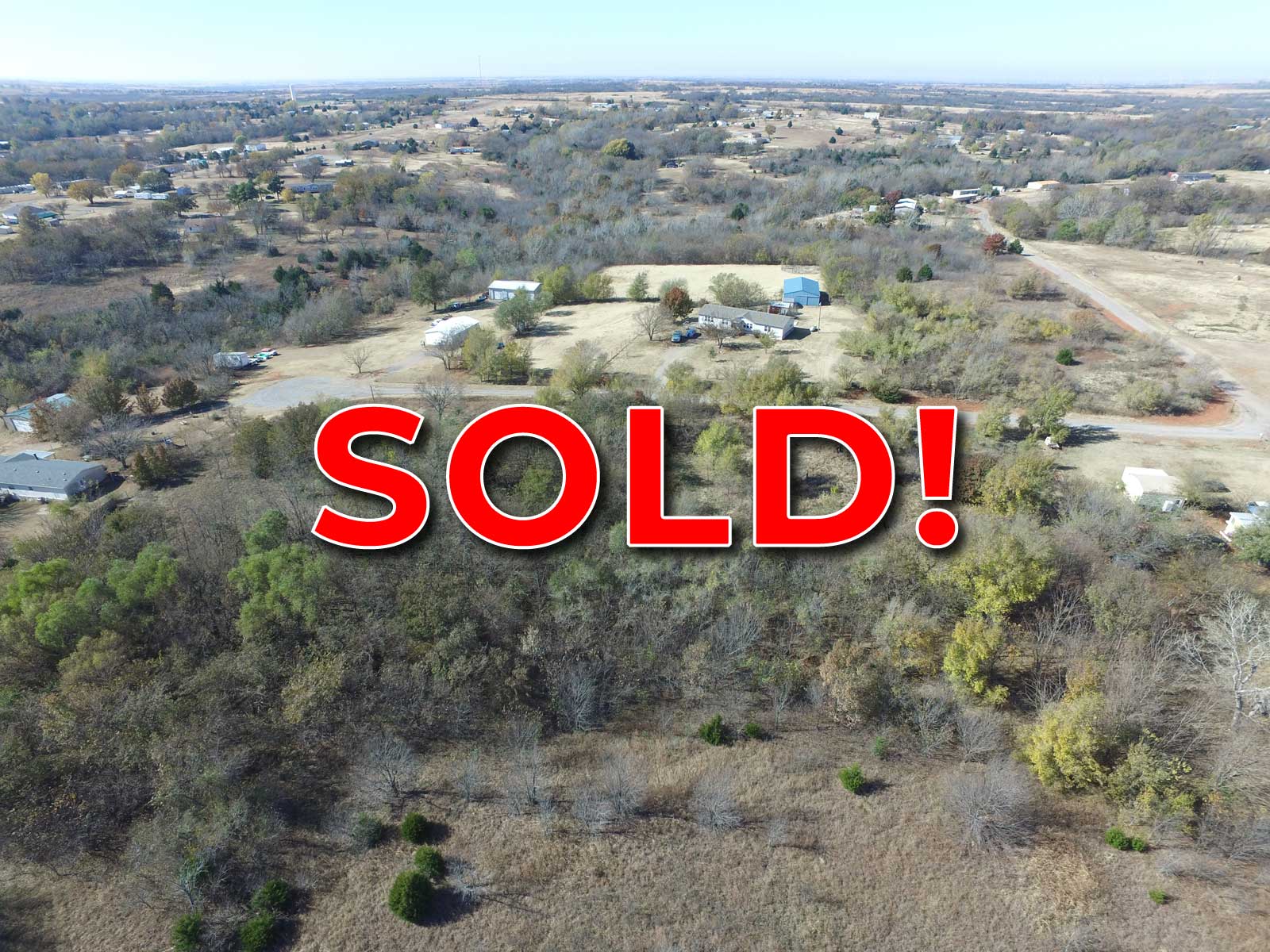 2.5 acre lot 25 miles from Oklahoma City with utilities. Put your