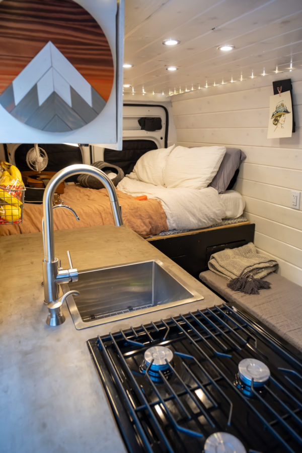 Financially Free in Their Van Conversion with a Wet Bath
