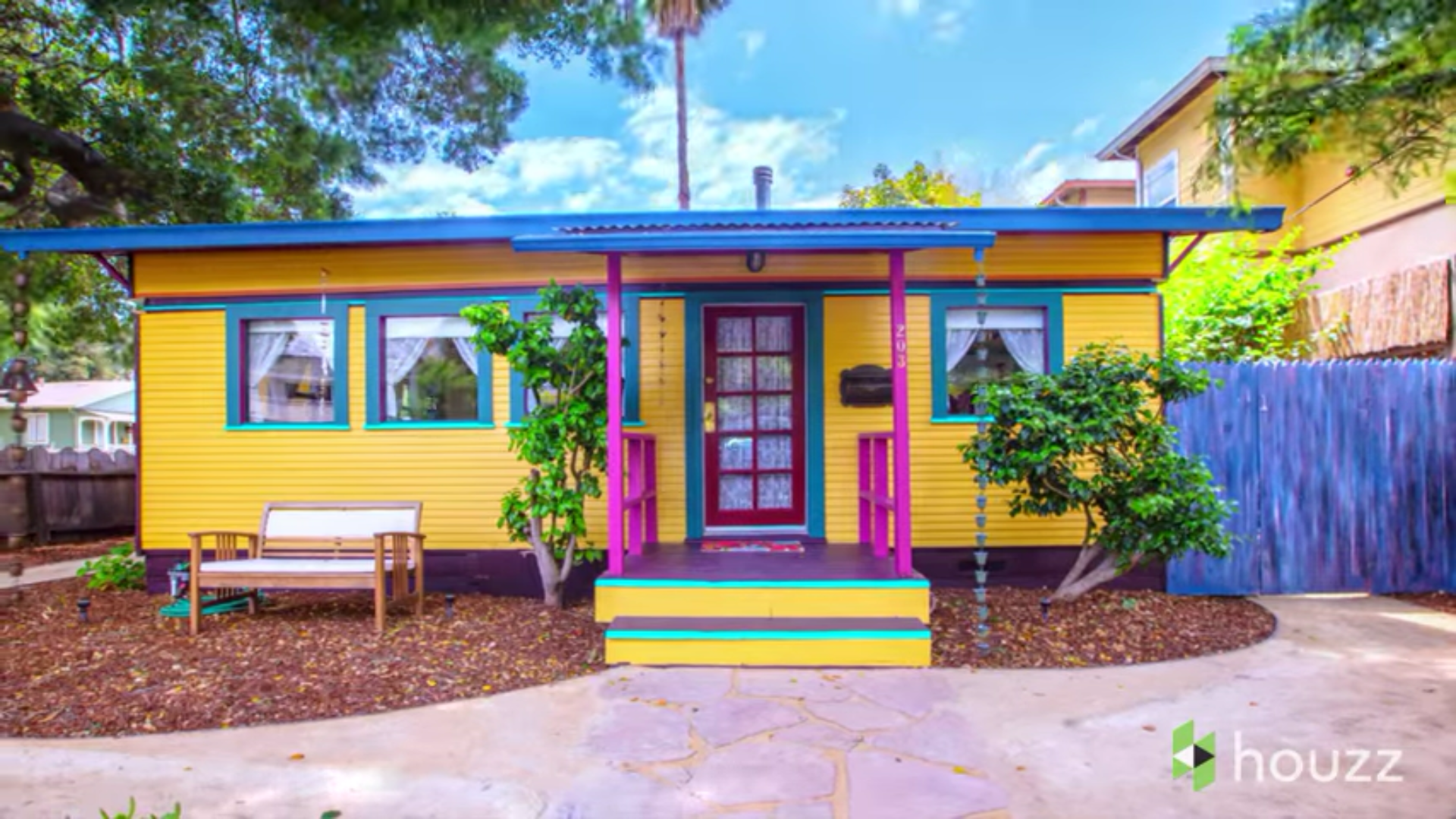 Funky, Whimsical Little House Built Using 1920s Streetcars