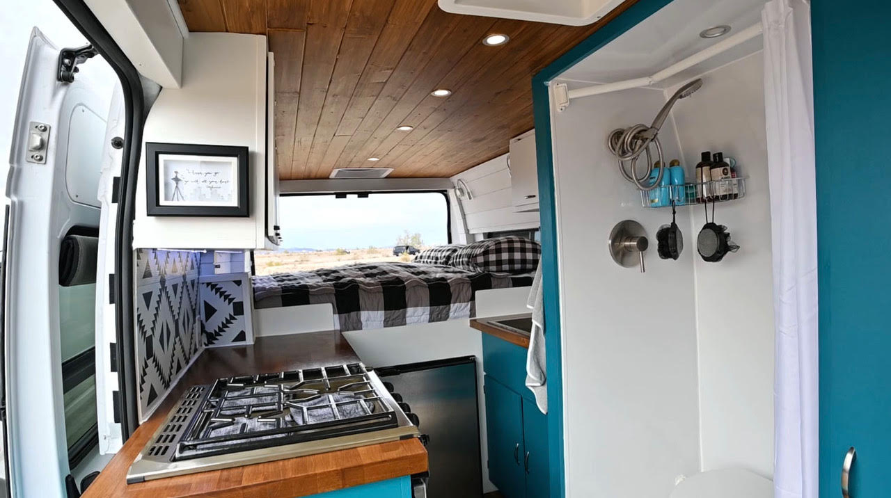 Couple's ProMaster 3500 Van Conversion With Shower And Toilet