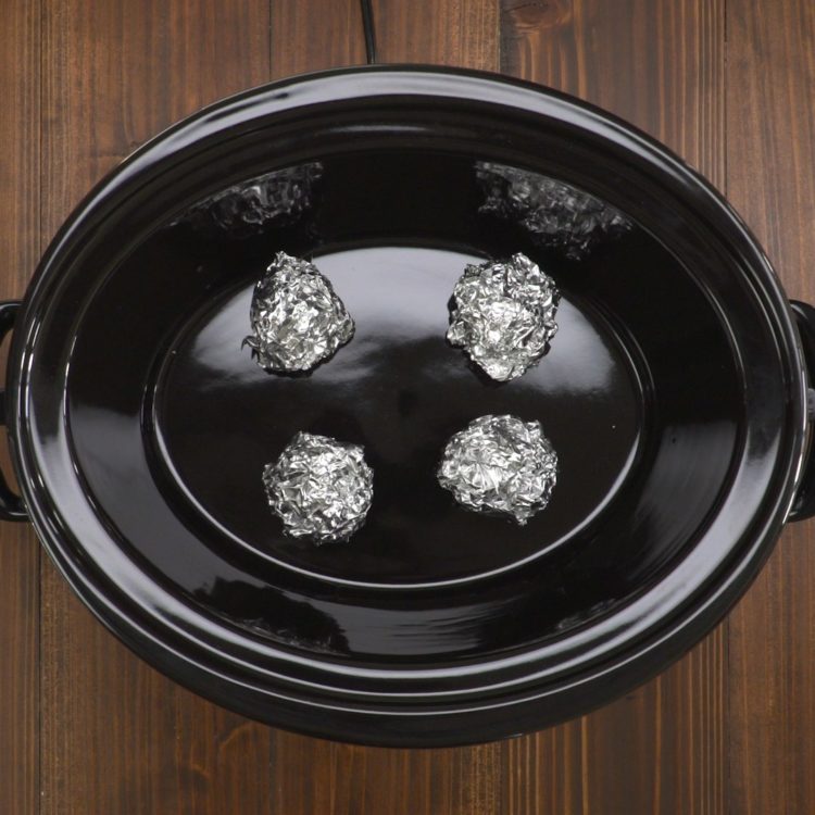 Slow Cooker Whole Chicken Recipe & Video TipHero