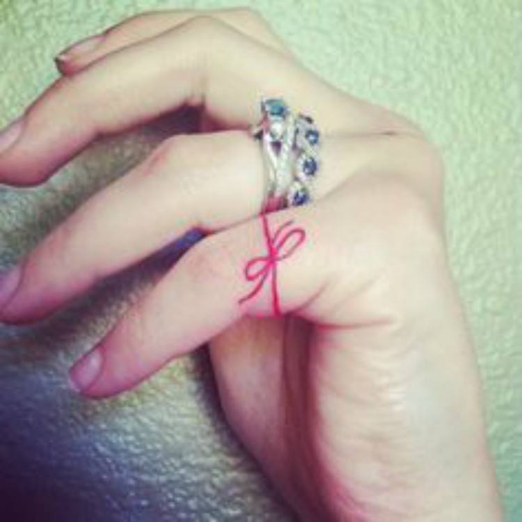 Why People Are In Love With Red String Tattoos 750_x_750_jpg