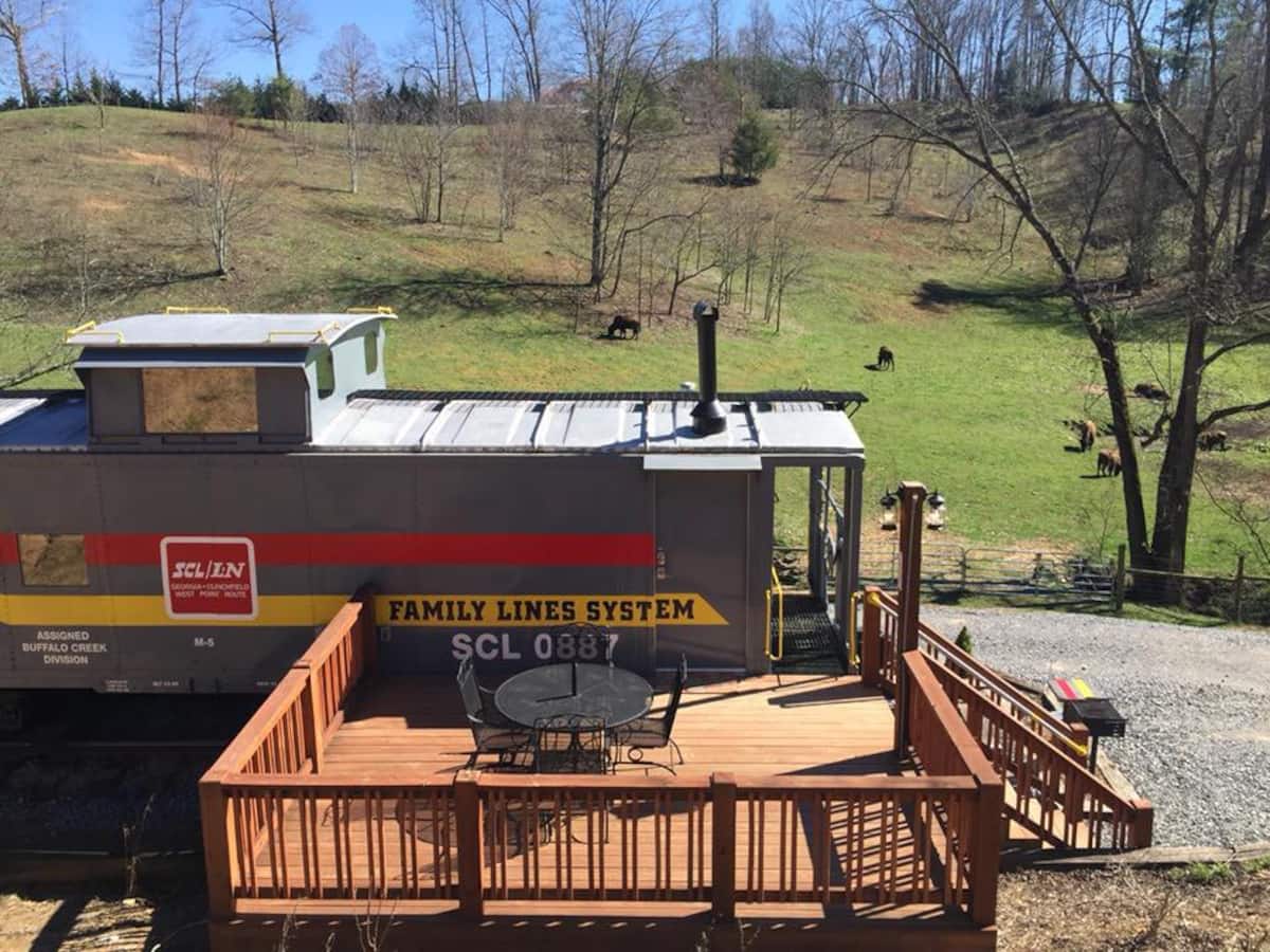 This 2023 tiny house is made out of a train caboose!
