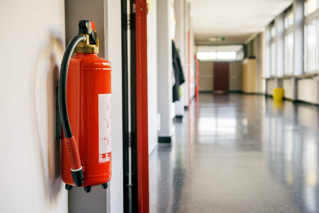 How often should fire extinguishers be serviced?