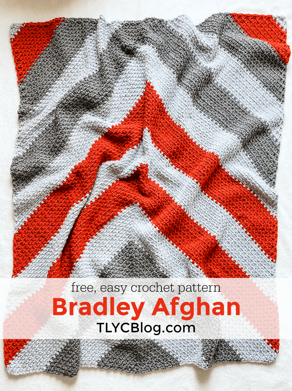 Bradley Afghan | Free chunky crochet afghan blanket pattern, crochet chevron linen moss stitch, geometric modern striped crochet blanket, free chunky beginner crochet afghan pattern. | TLYCBlog.com