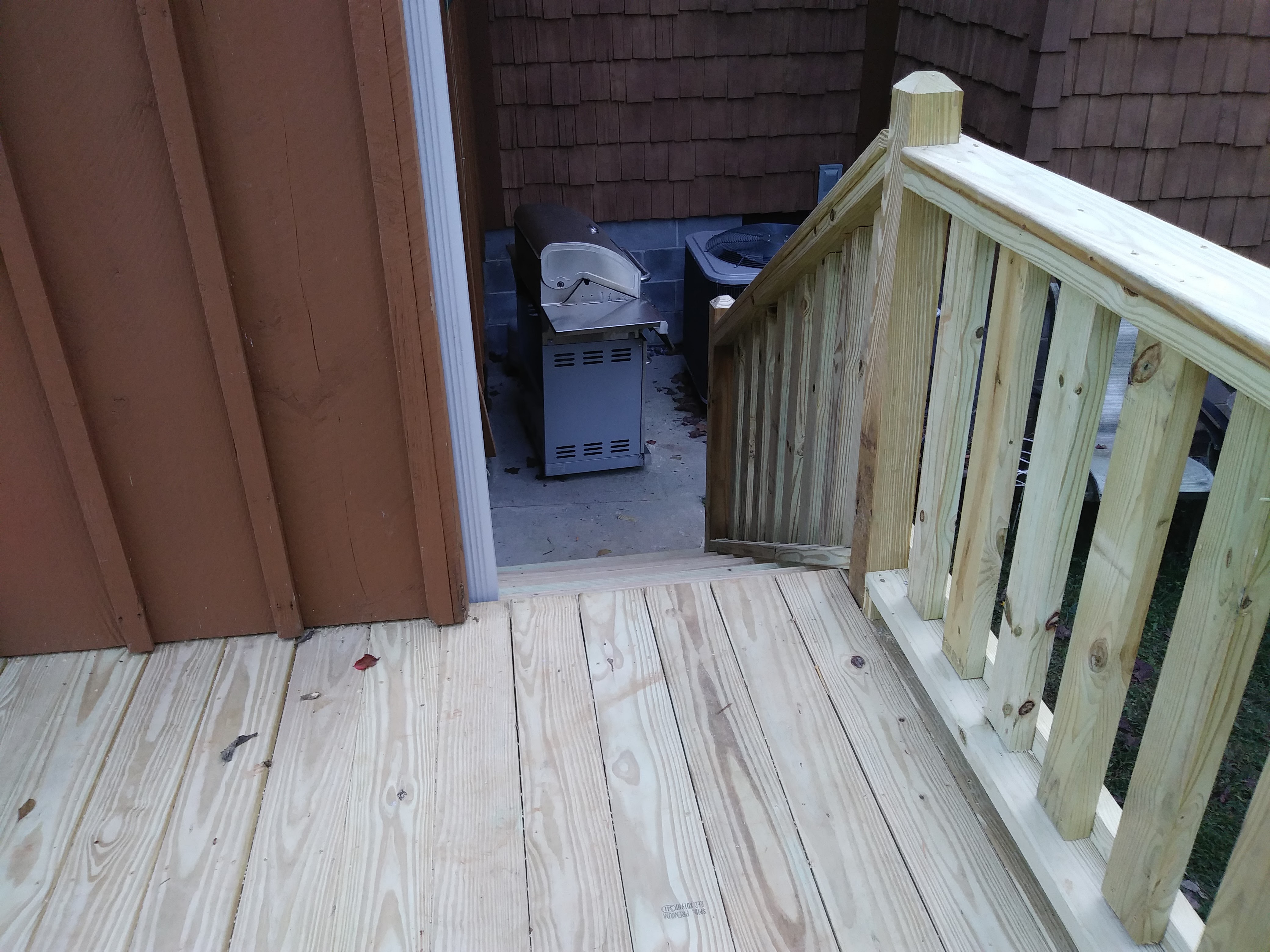 This deck is on the back of a log cabin in walland tennessee. The