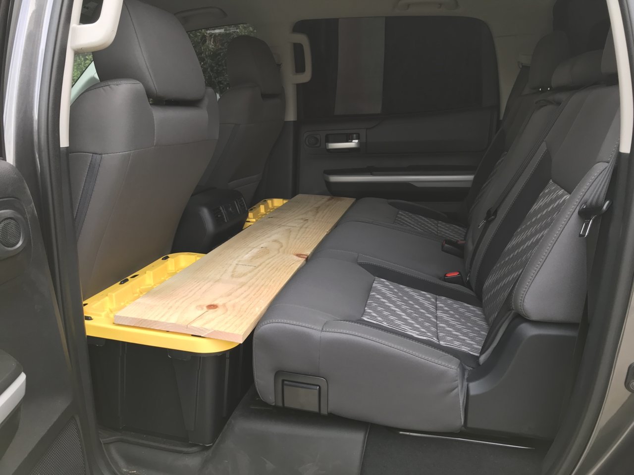 2013 Tundra is there a way to make the back seat lay flat for sleeping