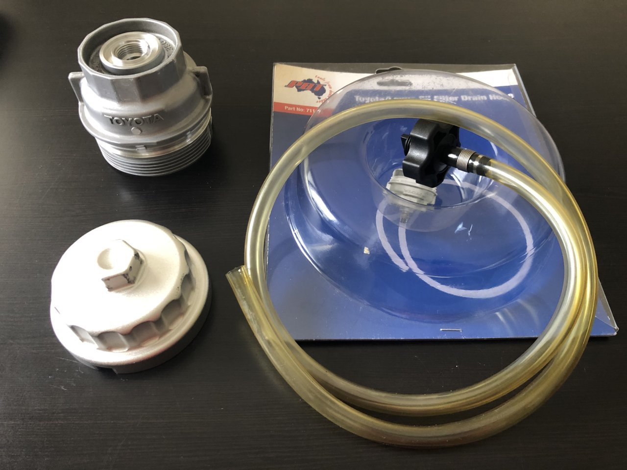 SOLD Toyota Metal Oil Filter Cap + wrench + drain valve/hose. Toyota