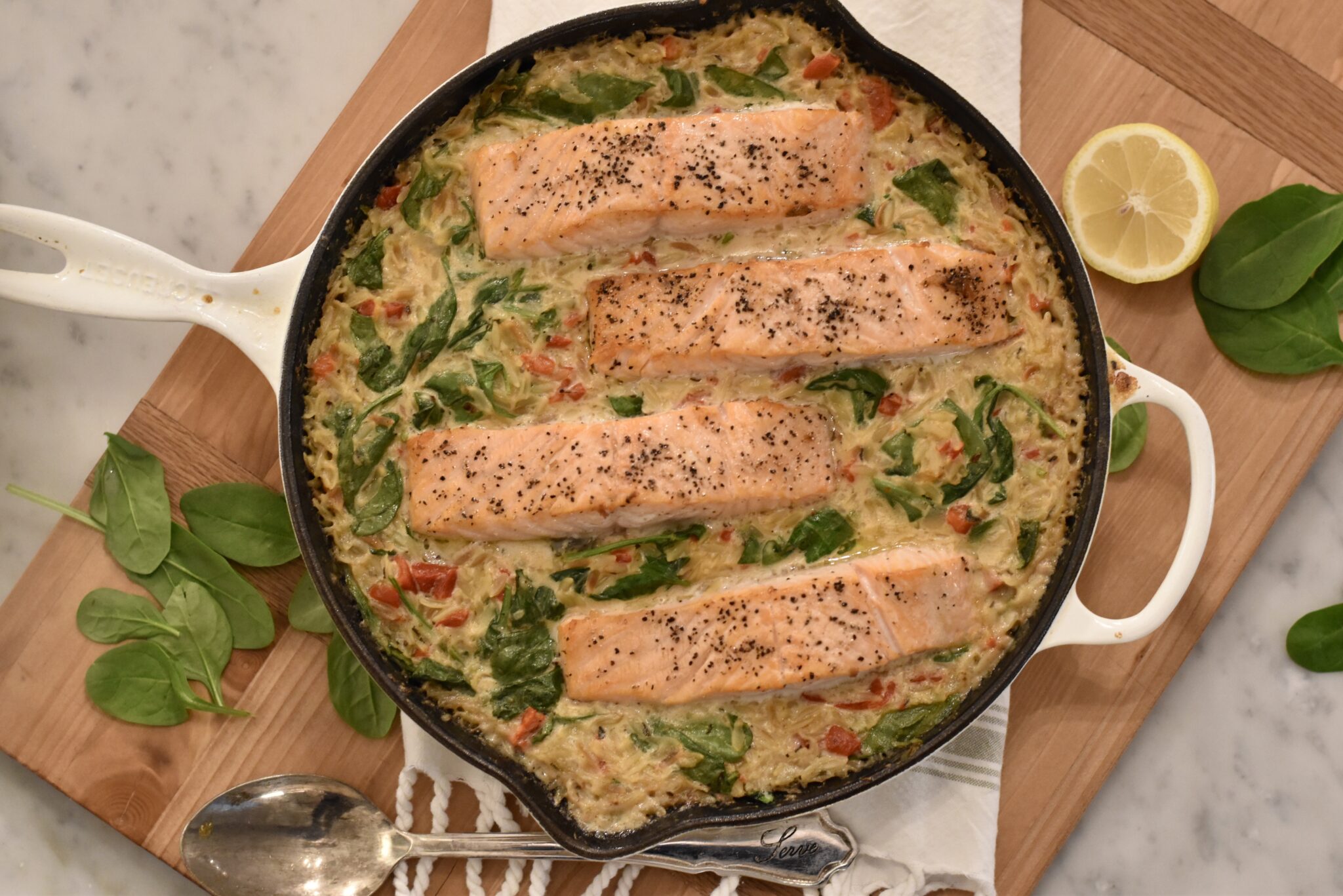One Skillet Salmon Recipe in a Creamy Orzo Sauce to have + to host