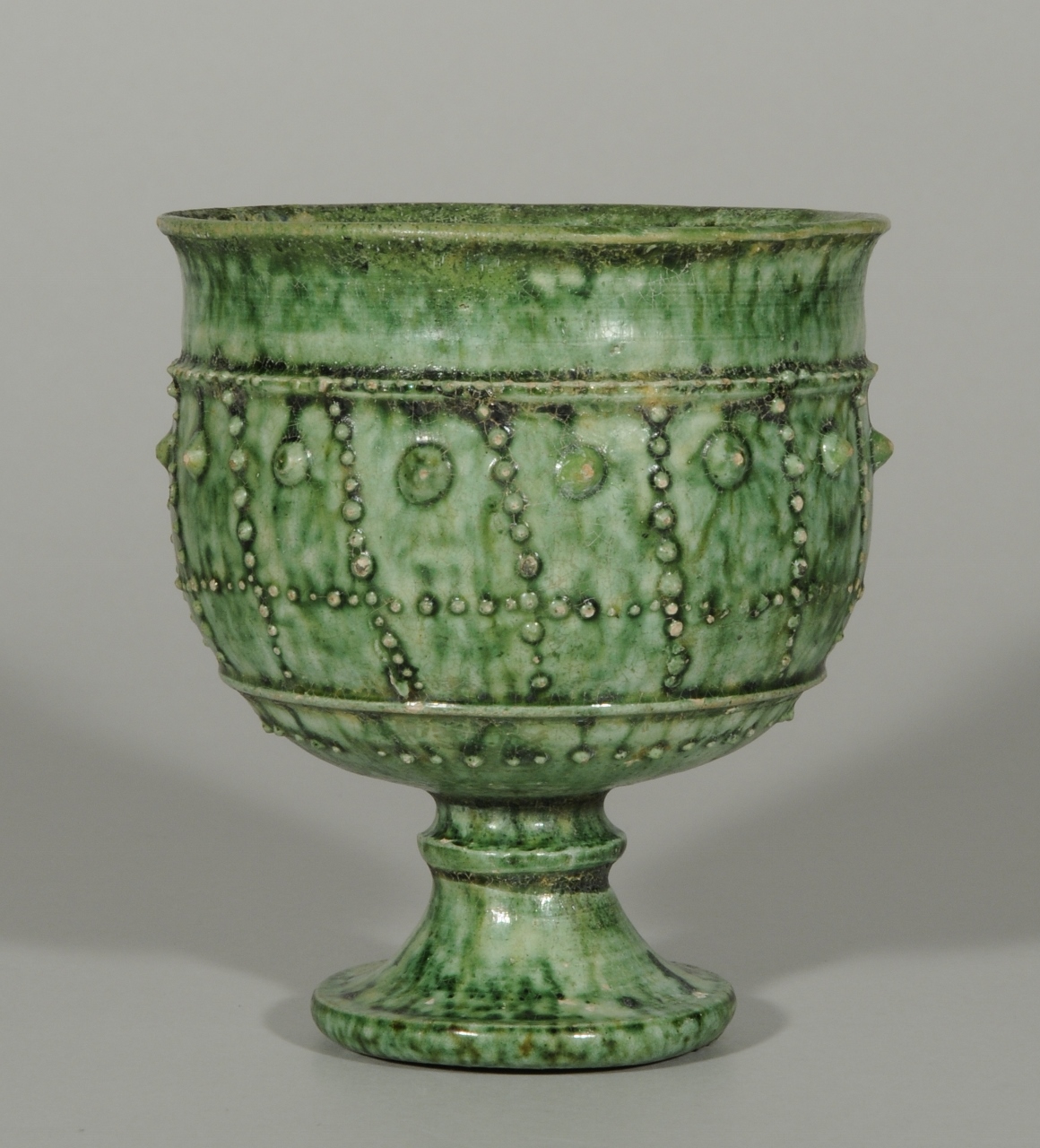 Stem cup with beaded design of pointed applied spots covered with