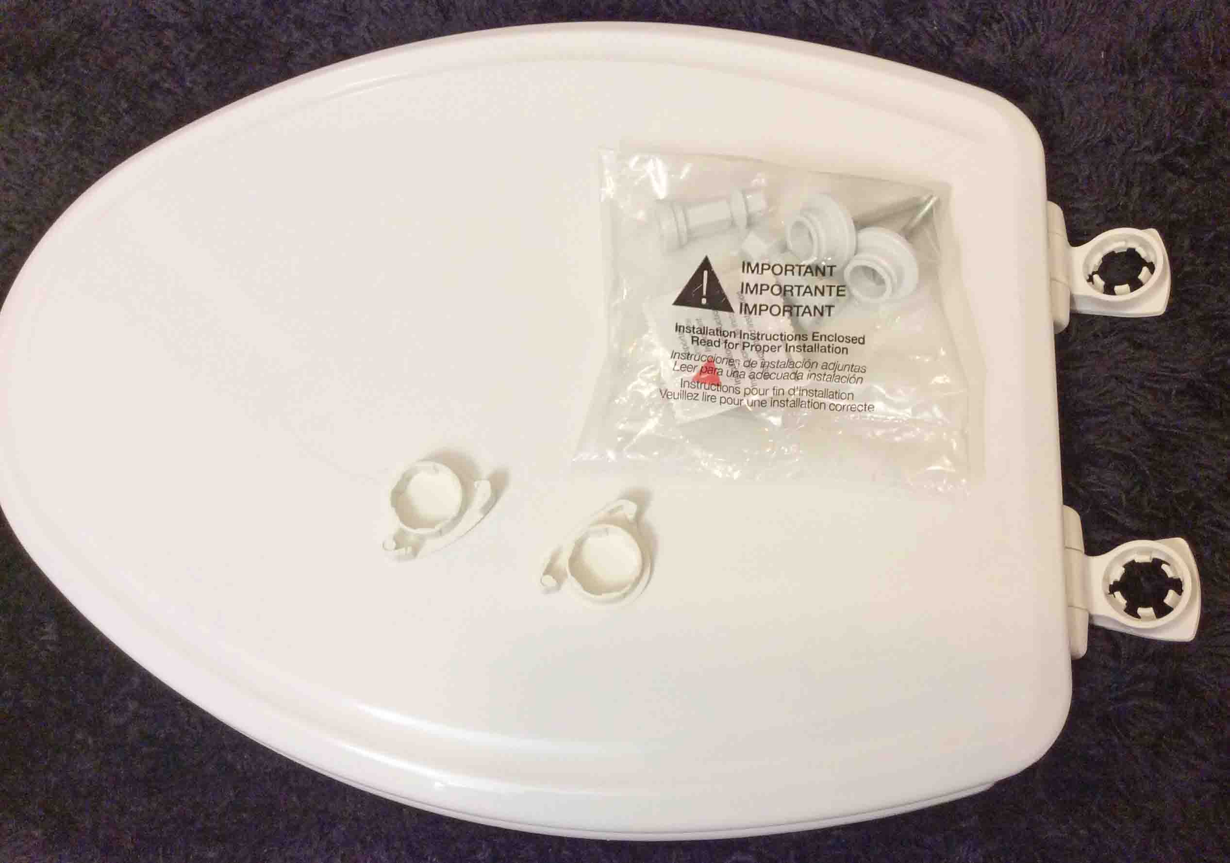 How To Replace a Toilet Seat, Install a New One Tom's Tek Stop