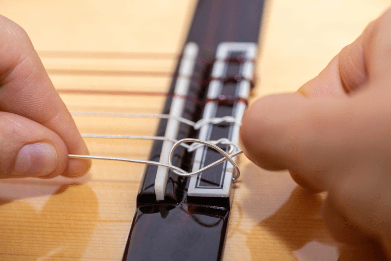 Restringing an Acoustic Guitar How Much Does It Cost? Tone Man