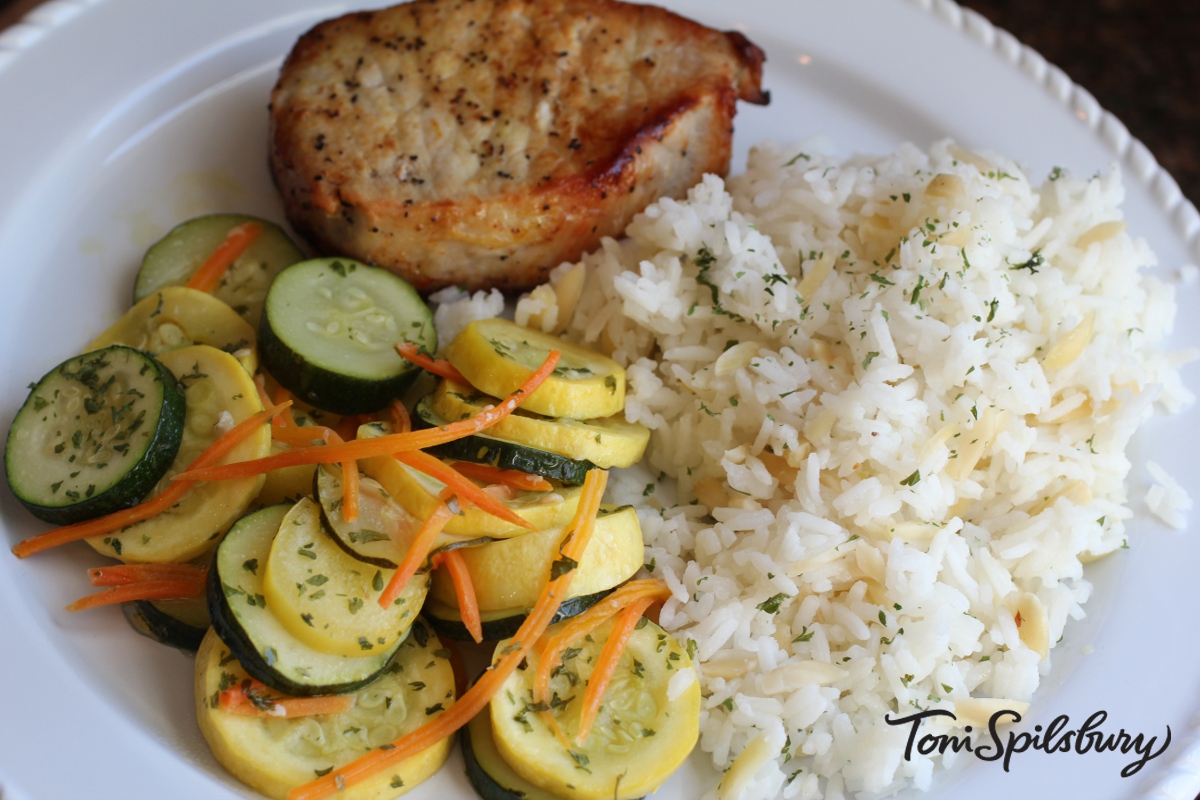 Lemon Pepper Pork Chops with Rice Pilaf & Spring Veggie Sauté Toni