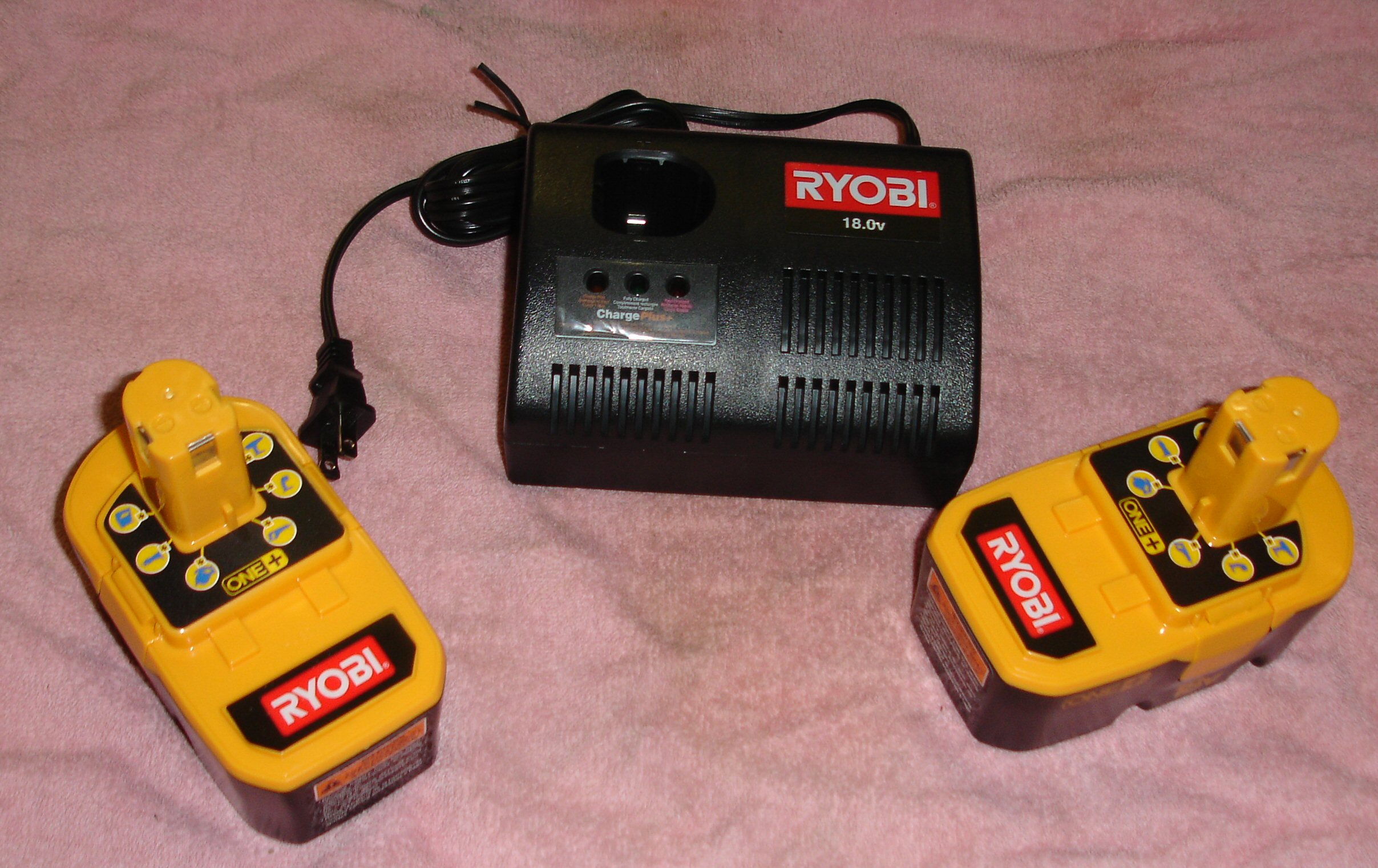 TWO Ryobi One+ P100 18v Batteries, P110 Charger NEW! eBay