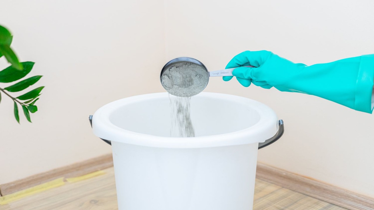 Add The Grout To The Bucket