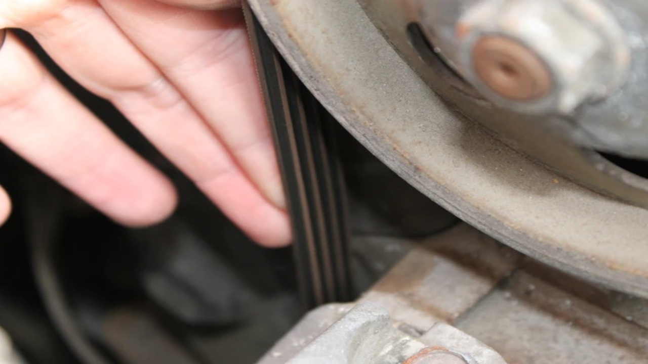 Checking If The Drive Belt Is Tight