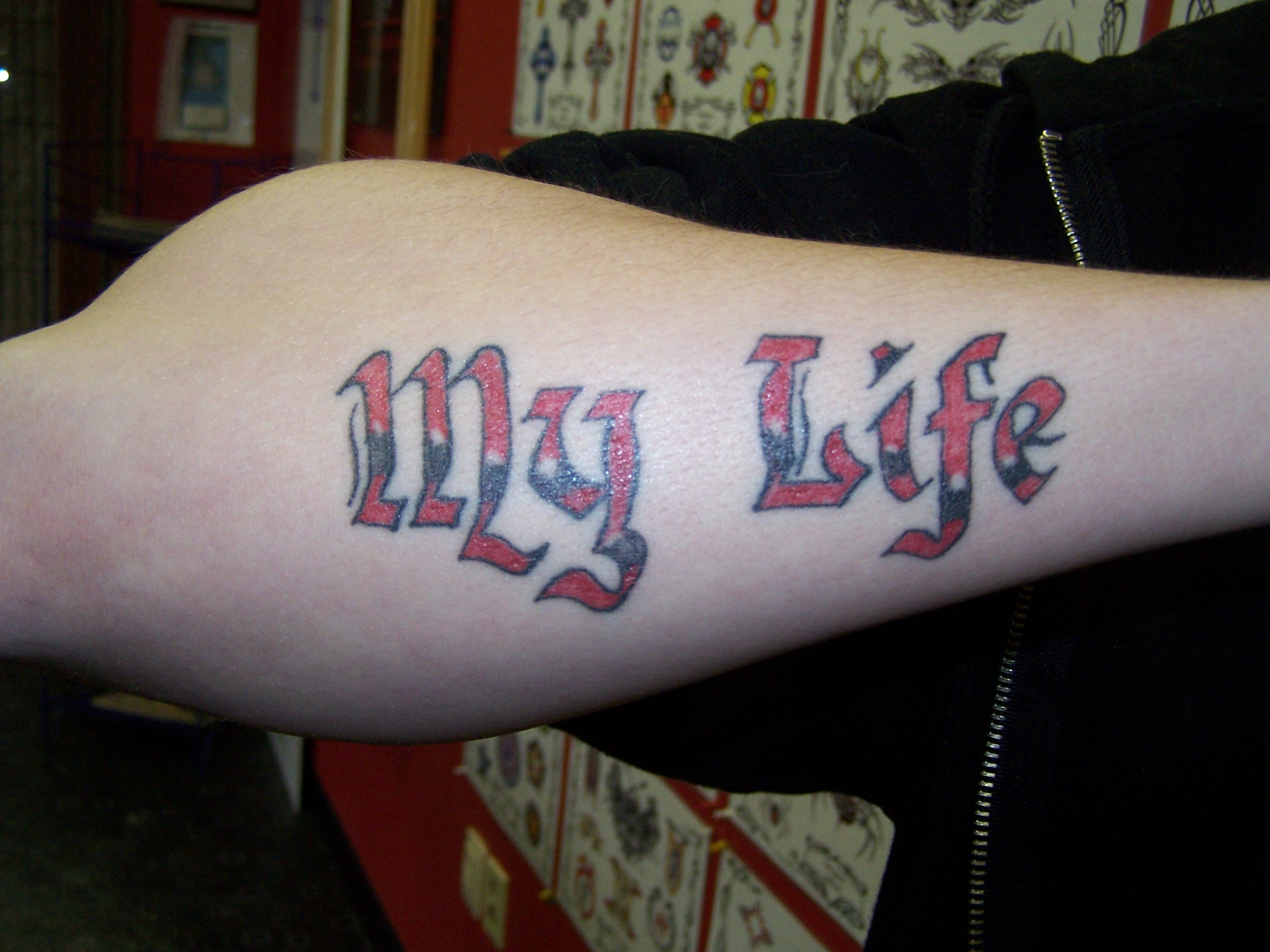 TOP OF THE LINE TATTOOZ