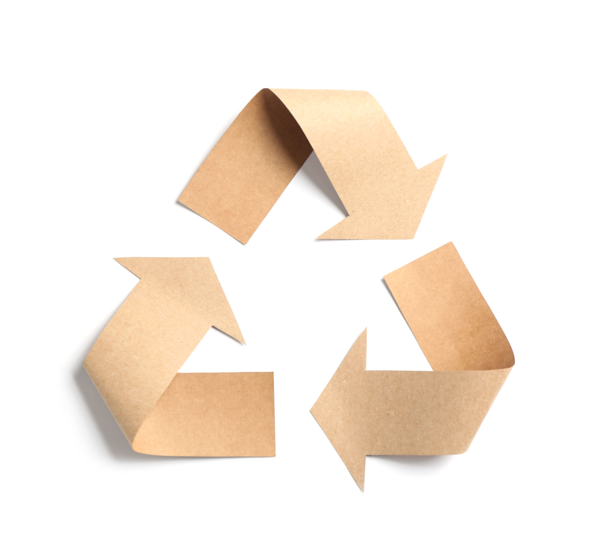 Recycling symbol cut out of kraft paper on white background, top view Recycling symbol cut out of kraft paper on white background, top view