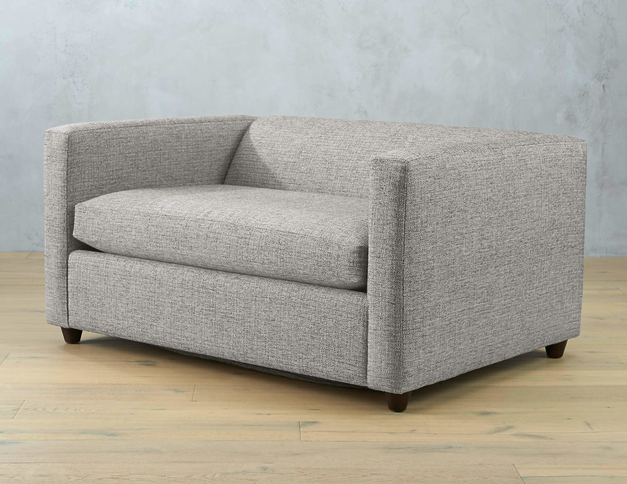 Eighteen stylish, compact couches and loveseats for small spaces