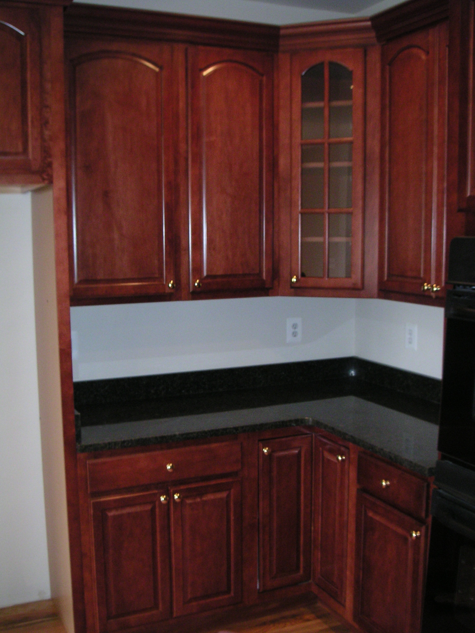 Place for the blender/toaster/etc. appliances, corner glass