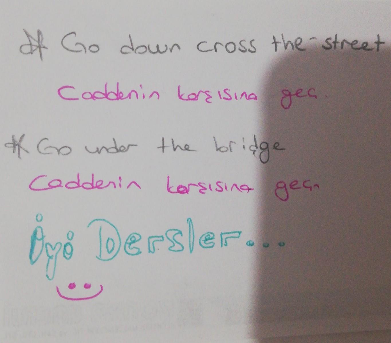 Go down Cross the street ve go under the bridge NE demek