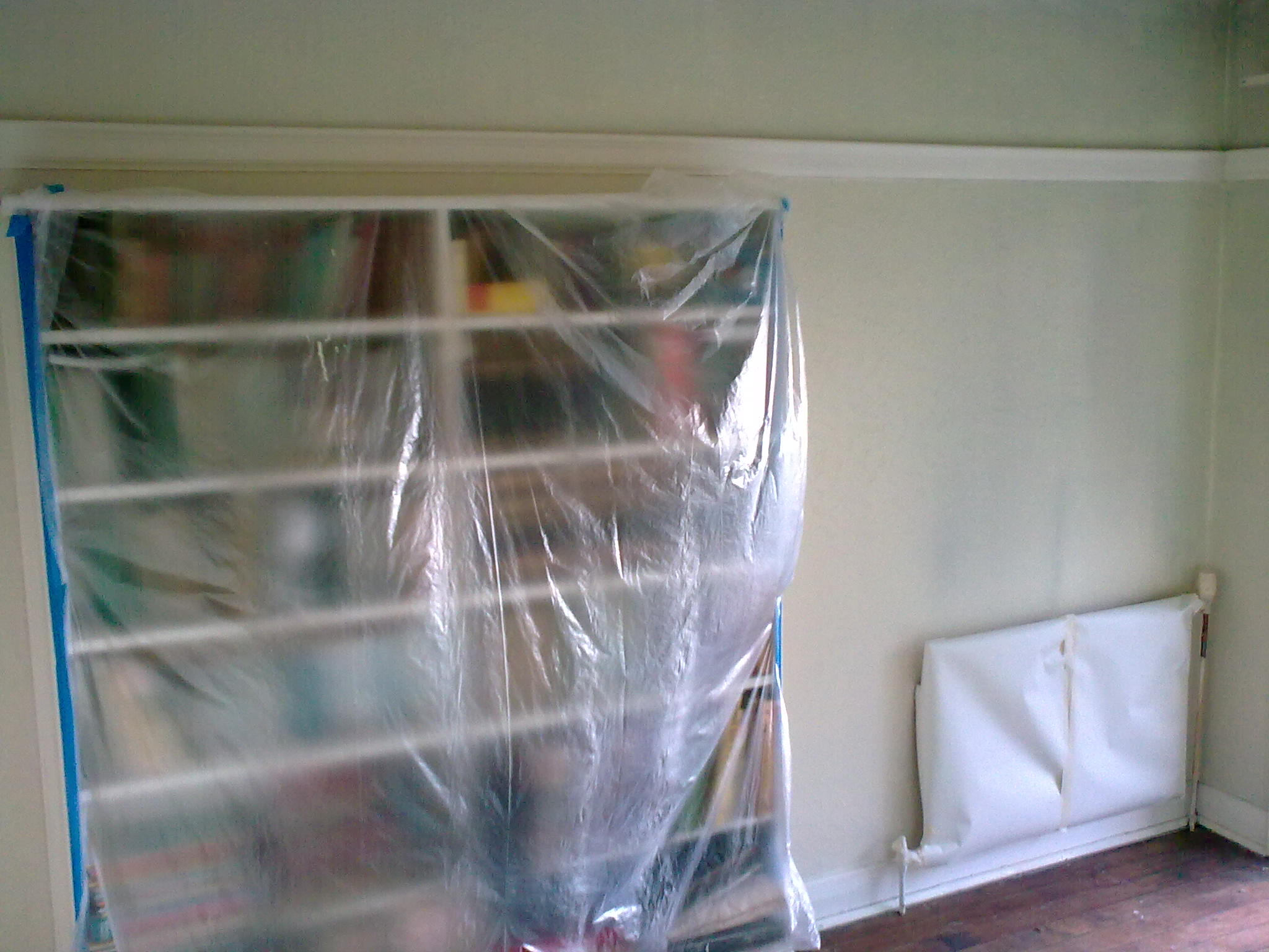 Attention to detail masking up furniture Traditional Painter