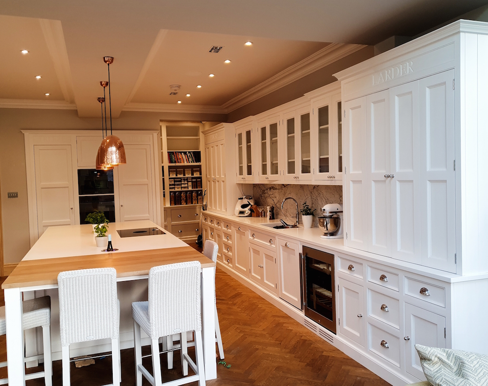 Big white wooden Christchurch hand painted kitchen in Surrey