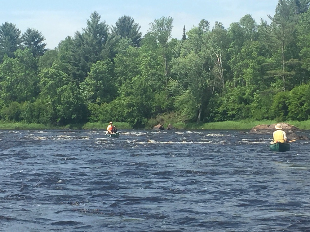 Flambeau River rapids canoeing adventure in northern Wisconsin