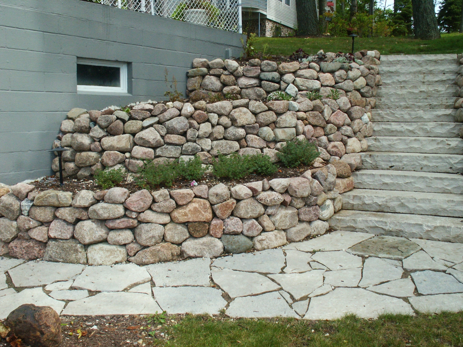 Retaining Walls and Outcroppings Treetops Landscape Design Inc.