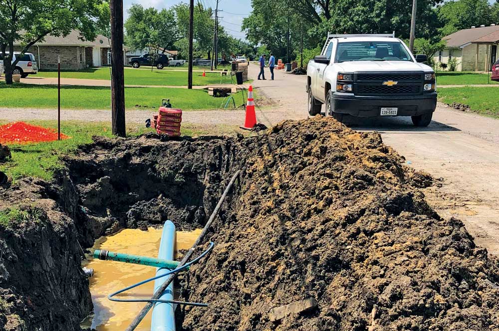 Getting their Feet Wet Mesquite, Texas, Gives Pipe Bursting and New