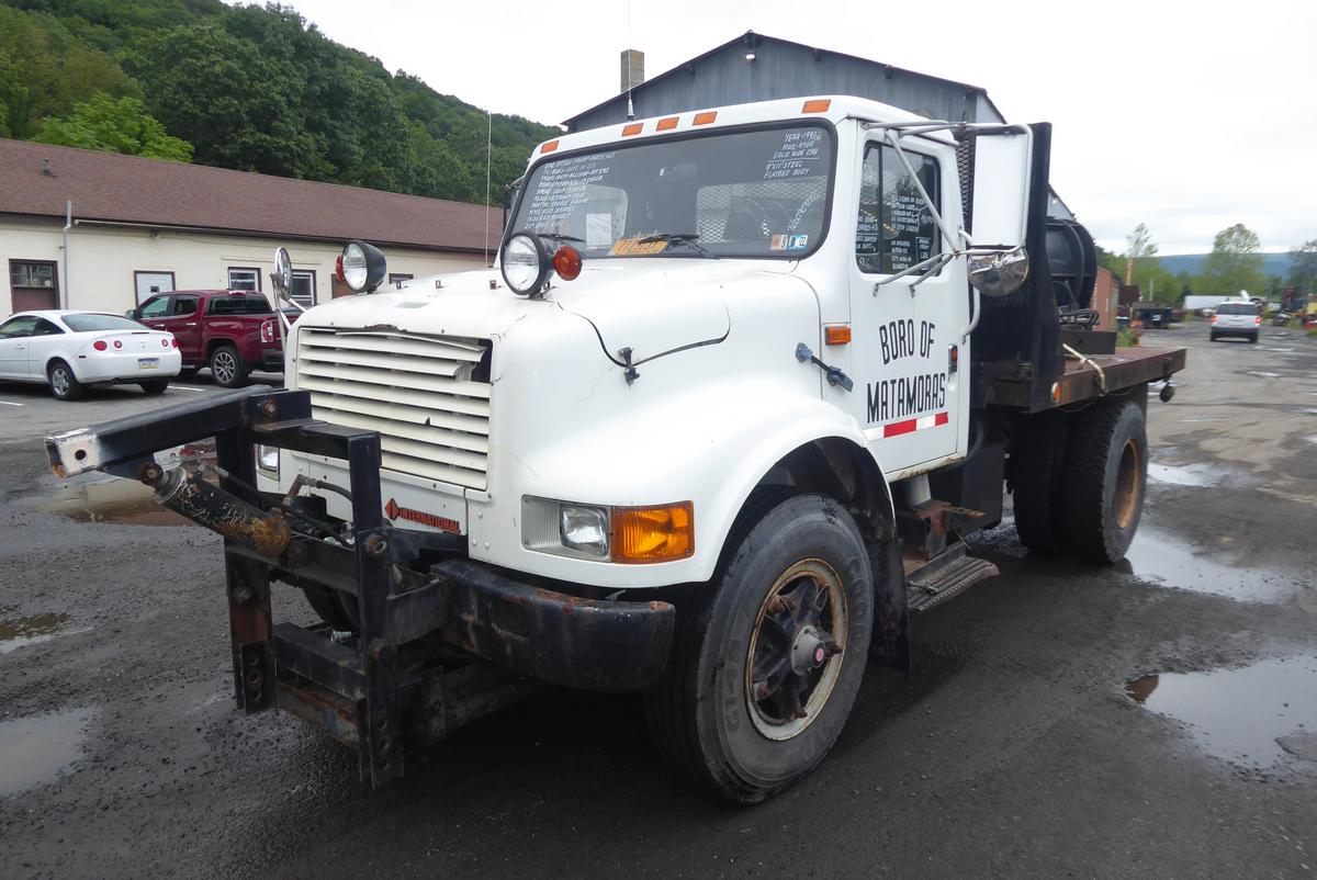 1990 International 4700 Single Axle Flatbed Truck for sale by Arthur