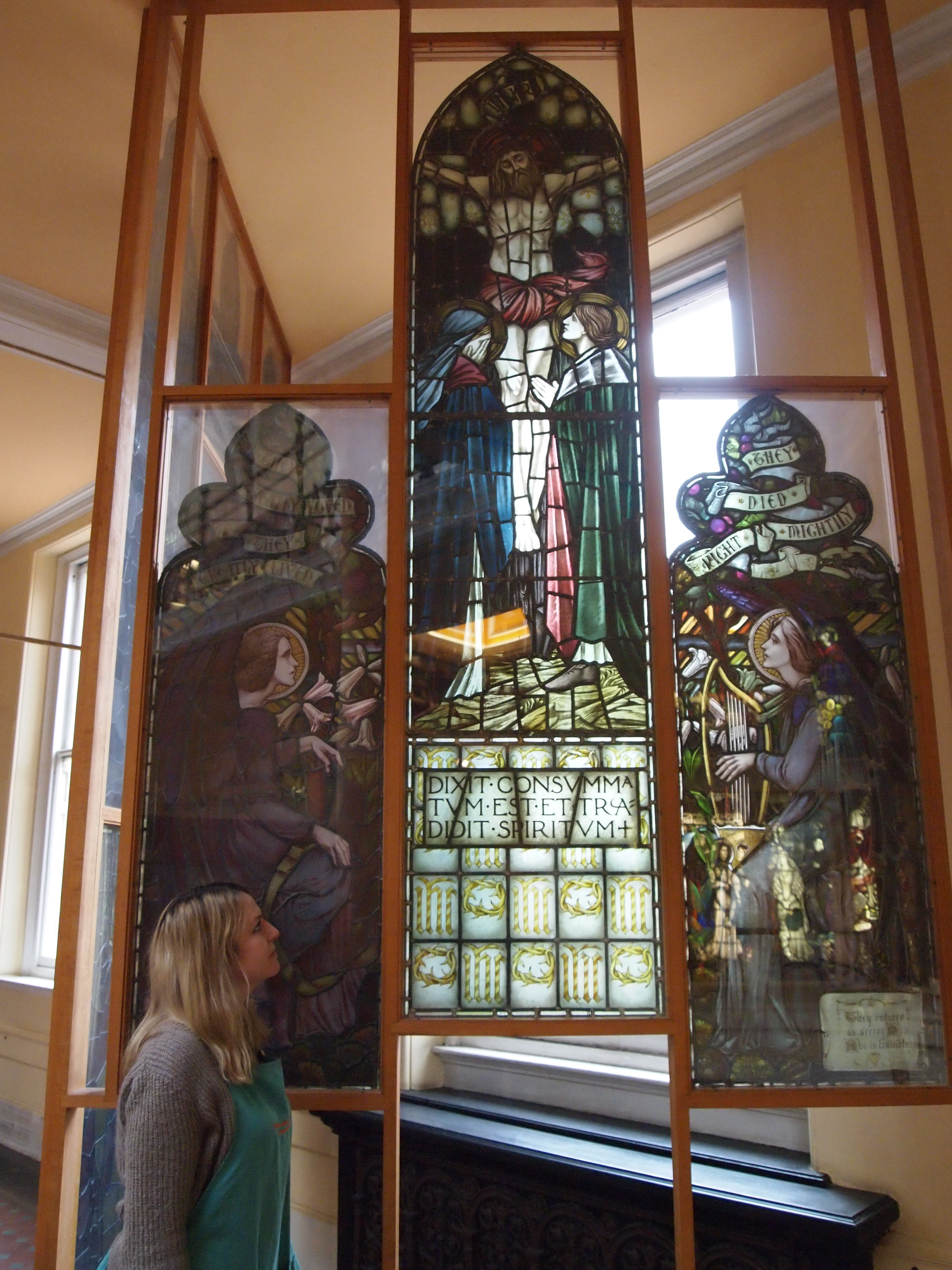 Lizzie assesses stained glass on display Tru Vue, Inc