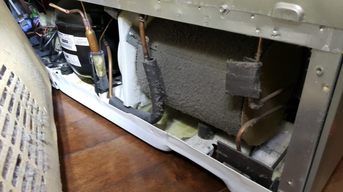 How do I fix my GE refrigerator that is not cooling?