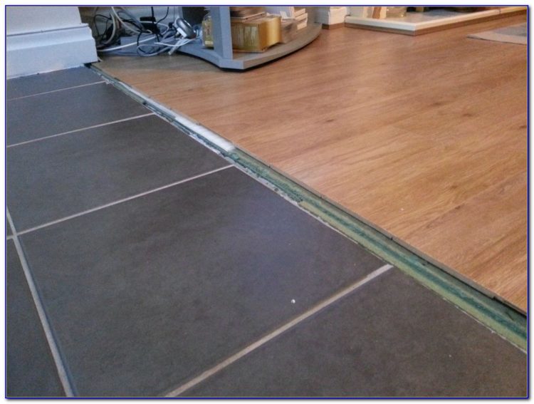 How do you install laminate transition strips?